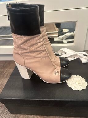 CHANEL Two-Tone Leather Cap-Toe Block Heel Ankle Boots in Beige and Black